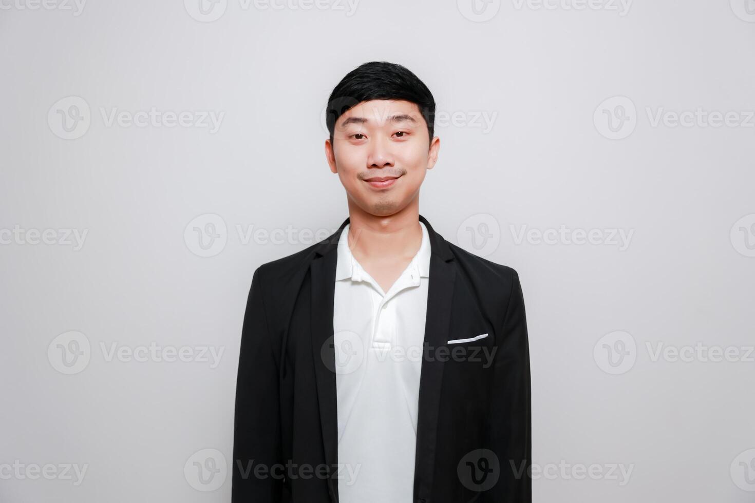 Cheerful asian man black suit happy smile isolate photo