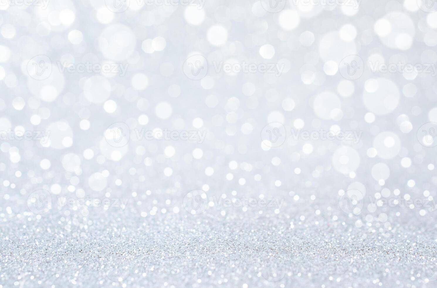 White Glitter and Bokeh Background. Sparkling Holiday Light Texture. Stock photo. photo