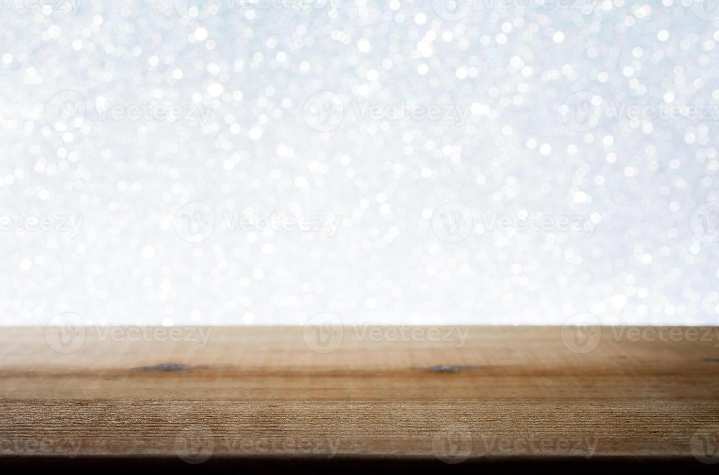 Wooden Table with White Bokeh Background. Festive Light Backdrop. Stock photo. photo