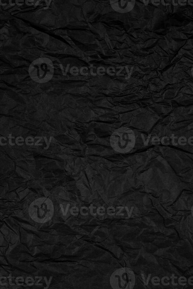 Crumpled Black Paper Texture. Dark Wrinkled Background. Stock photo. photo