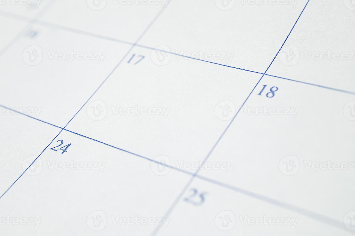 Close-Up of Calendar Page. Blank Date Grid for Planning and Scheduling. Stock photo. photo