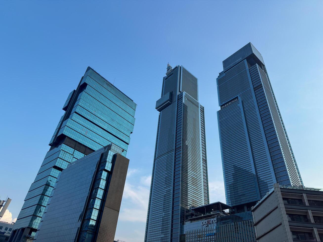 Jakarta, Indonesia, 2025 - view of skyscrapers in Jakarta. with autograph tower, tallest building in jakarta, beautiful city view with blue sky and fast asia city economic growth photo