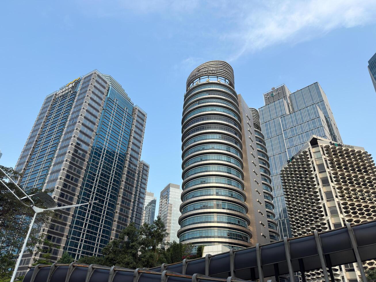 Jakarta, Indonesia, 2025 - menara mandiri and KRT Radjiman Wedyodiningrat Building is a tax office consisting of large taxpayers, located in sudirman photo