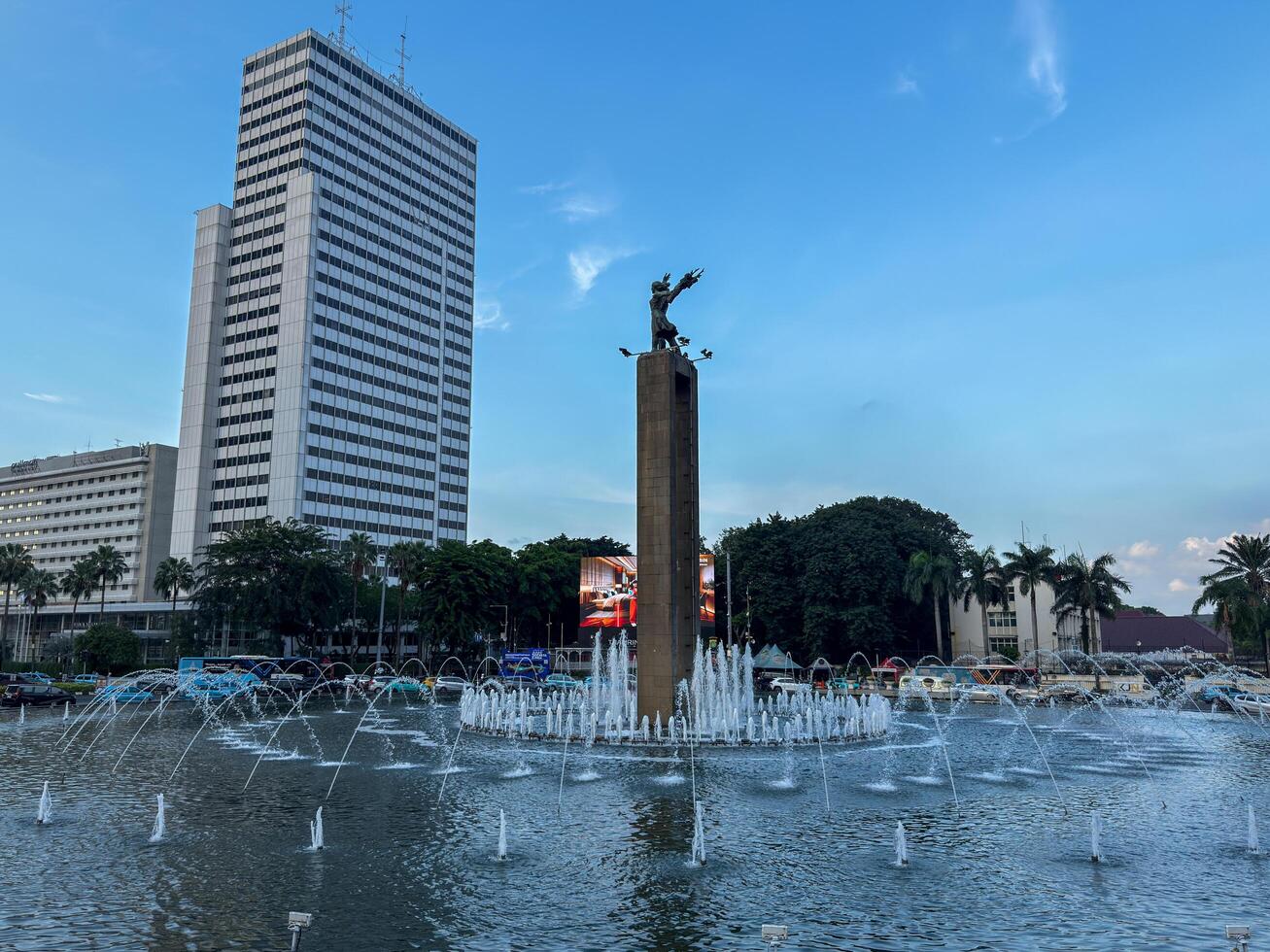 Jakarta, Indonesia, 2025 - Selamat Datang Monument or Welcome Monument or Monumen Bundaran HI or Monumen Bunderan HI is is a Jakarta landmark and is also the entrance gate to Jakarta. photo