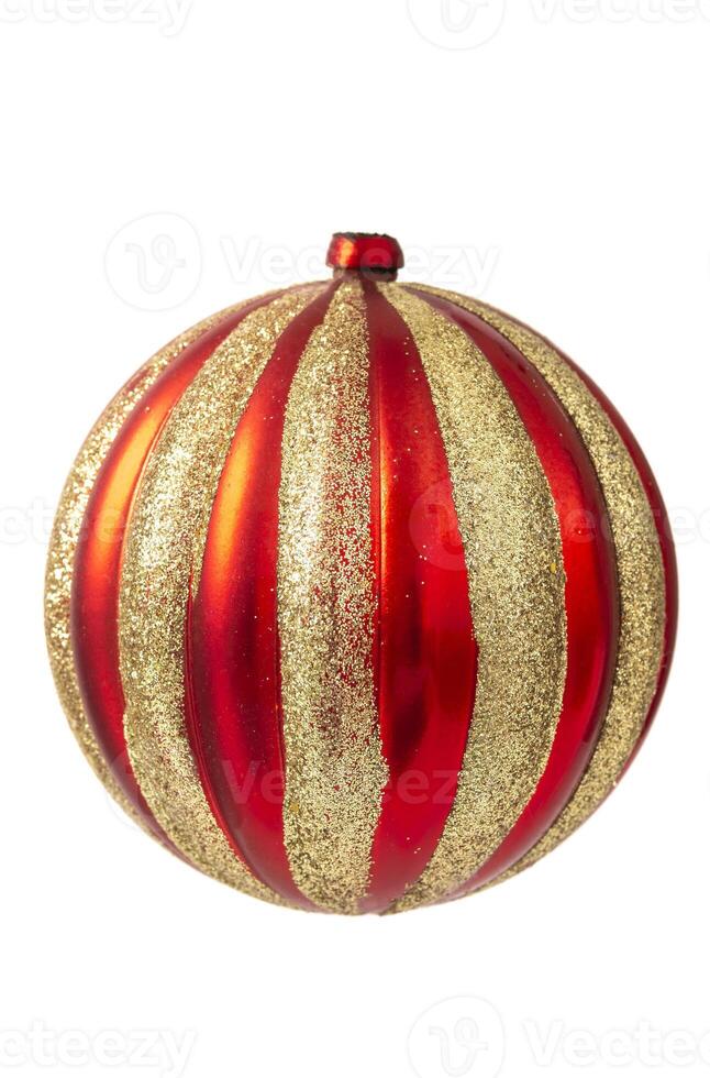 Close-up of a red Christmas ornament with a shiny surface and decorative textured pattern. Festive and vibrant holiday decoration. photo