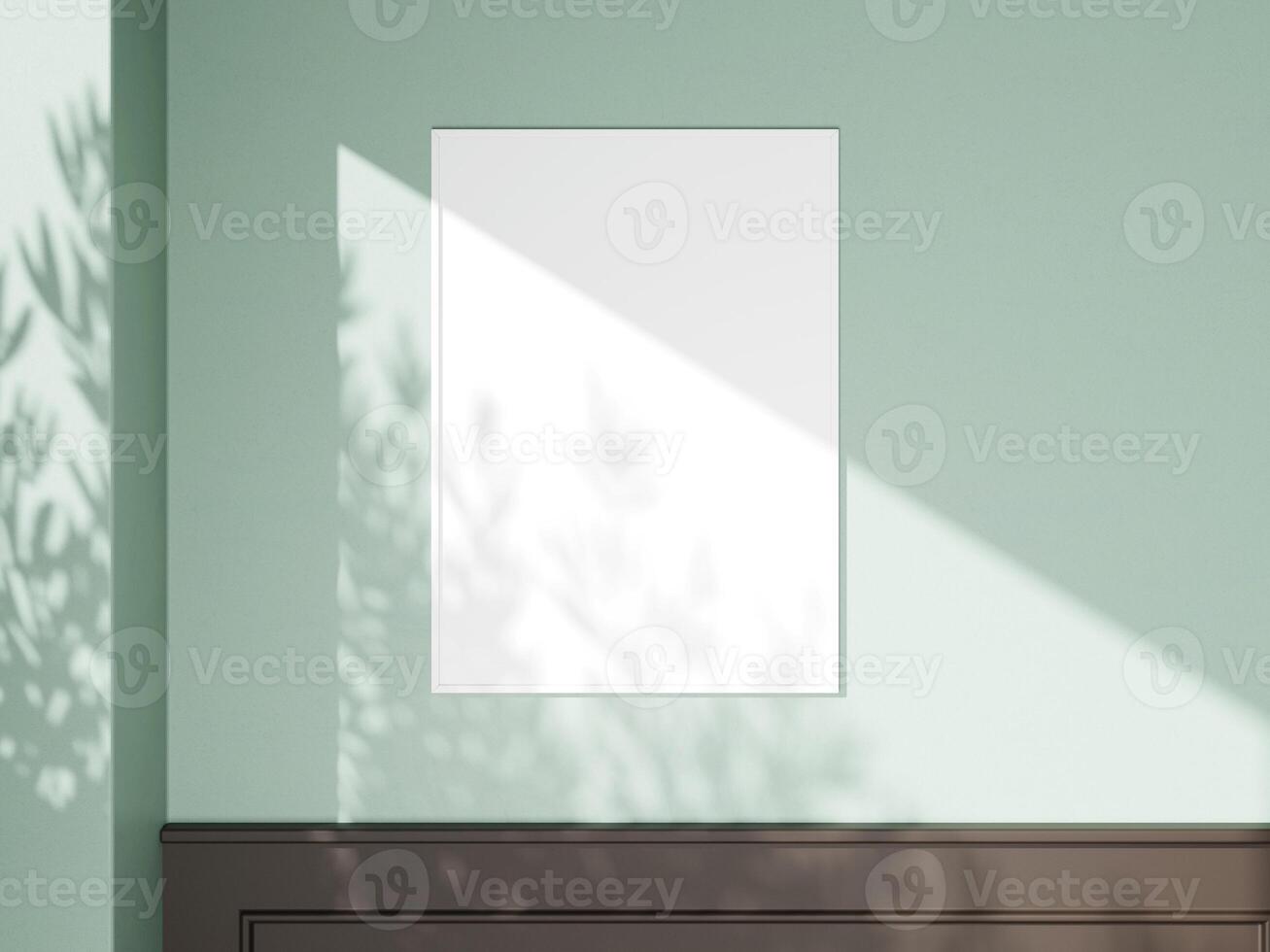 Clean and modern poster frame mockup with sunlight casting soft shadows. photo