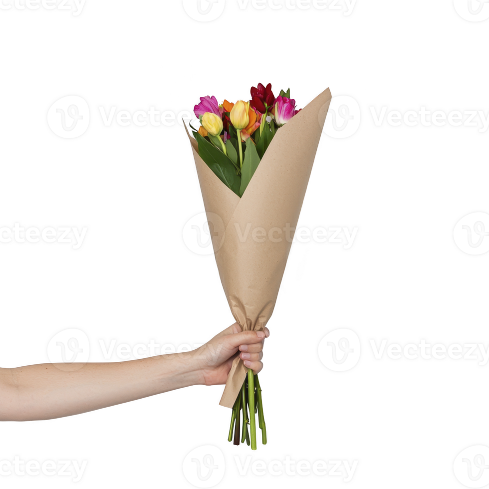 A hand holds vibrant bouquet of tulips wrapped in brown paper, showcasing mix of colorful flowers. arrangement is simple yet elegant, perfect for gifting or decoration png