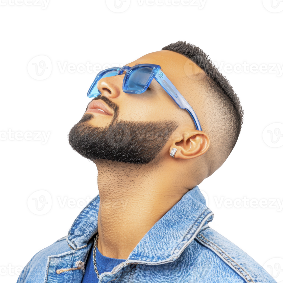 A stylish man with beard and sunglasses looks upward, wearing denim jacket. image conveys sense of confidence and modern fashion png