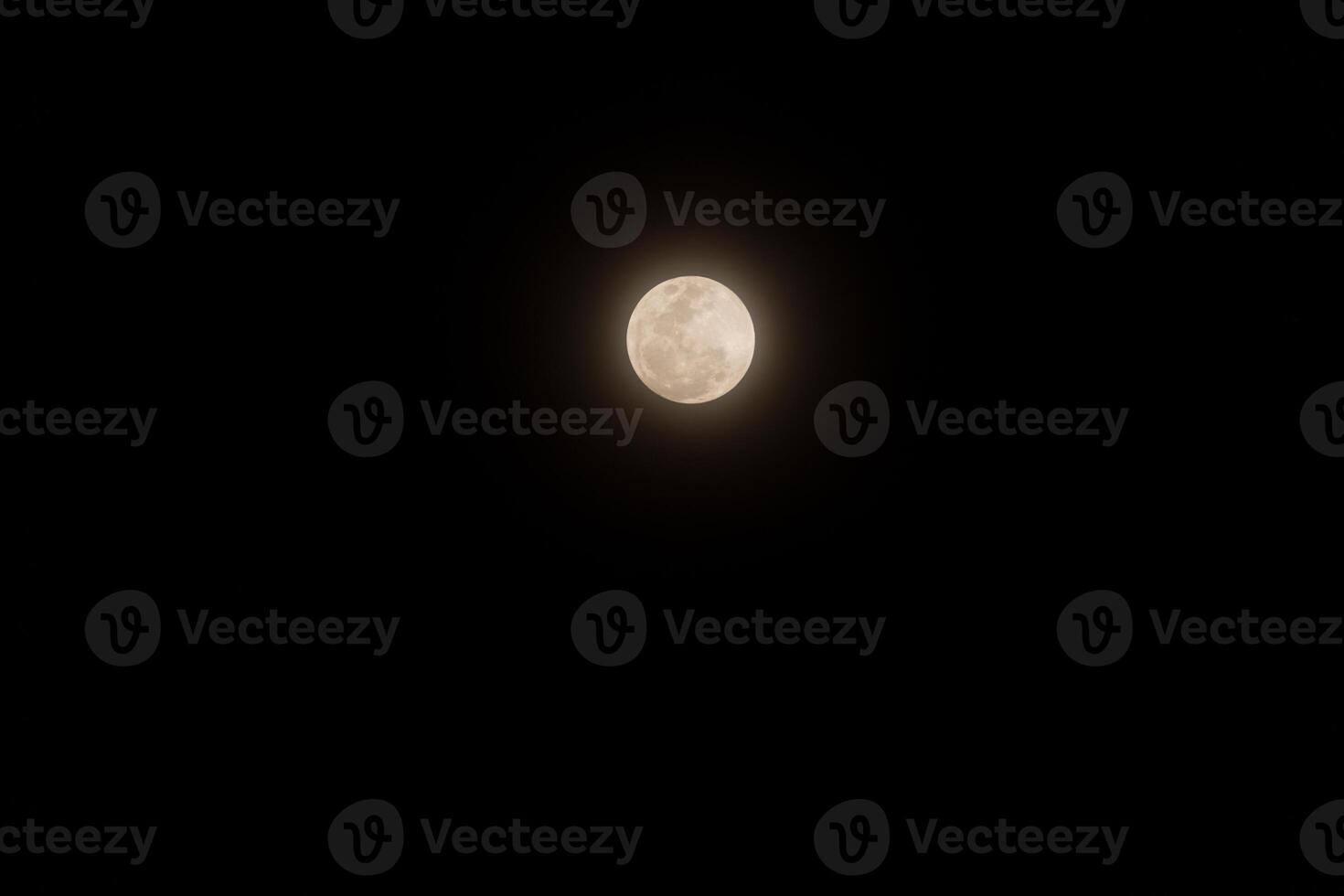Full moon against night sky photo