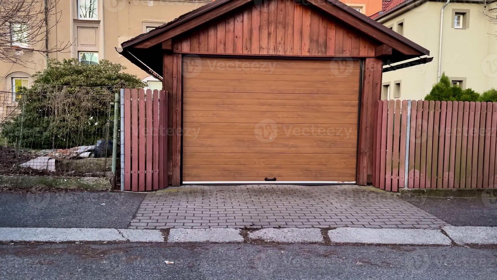 A captivating wooden garage stands proudly, surrounded by vibrant modern buildings and lush greenery photo