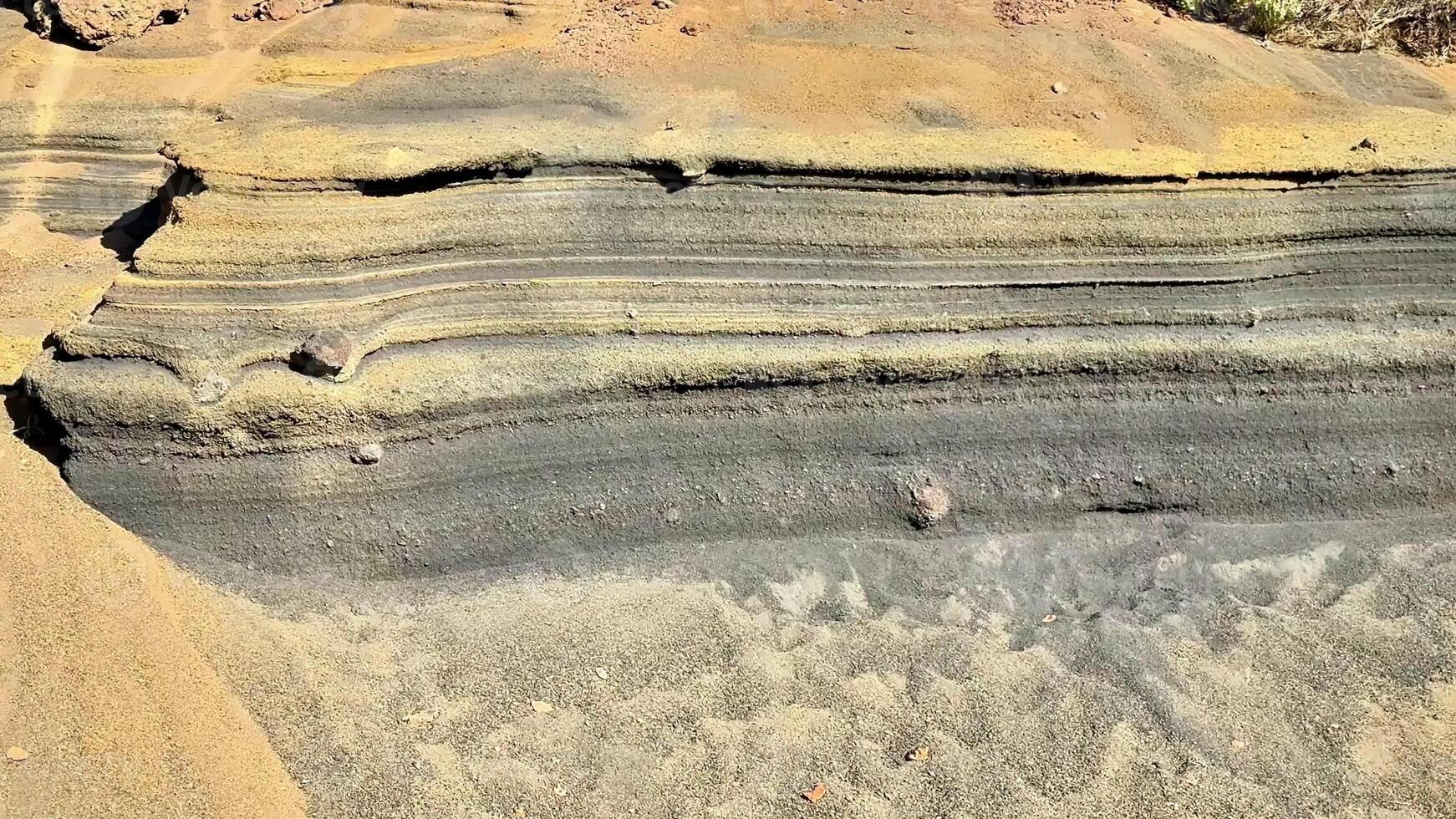 A breathtaking and stunning layered rock formation that showcases vibrant textures and colors in a natural landscape photo