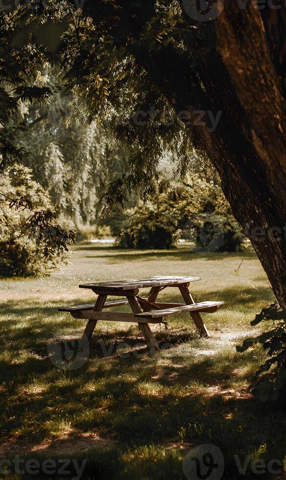 Rustic picnic table nestled under the canopy of trees creating a serene and inviting outdoor setting photo