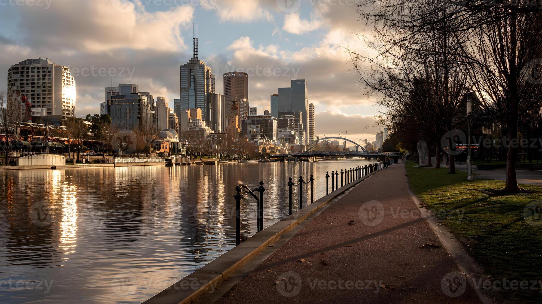 Melbourne's iconic skyline shines through on a serene day showcasing the city's architectural beauty, river reflection photo