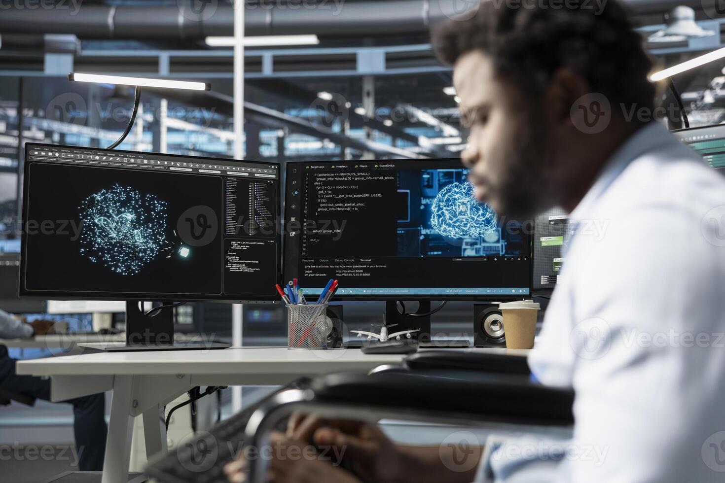 Data center engineer using artificial intelligence visualization tools to identify equipment malfunctions. Server room expert looking at insights to detect and prevent hardware failures photo