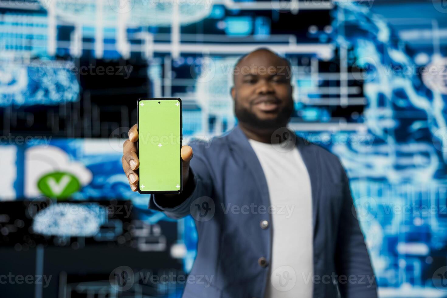 Black businessman using advanced technology and green screen on phone, exploring data science, automation and AI brain in a digital data visualization environment. Machine learning. photo