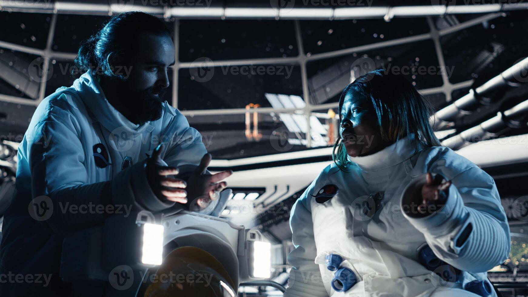 Teamworking cosmonauts chatting, exploring deep space during mankind survival expedition. Astronauts doing human expansion in space mission in spacecraft powered by advanced engineering photo