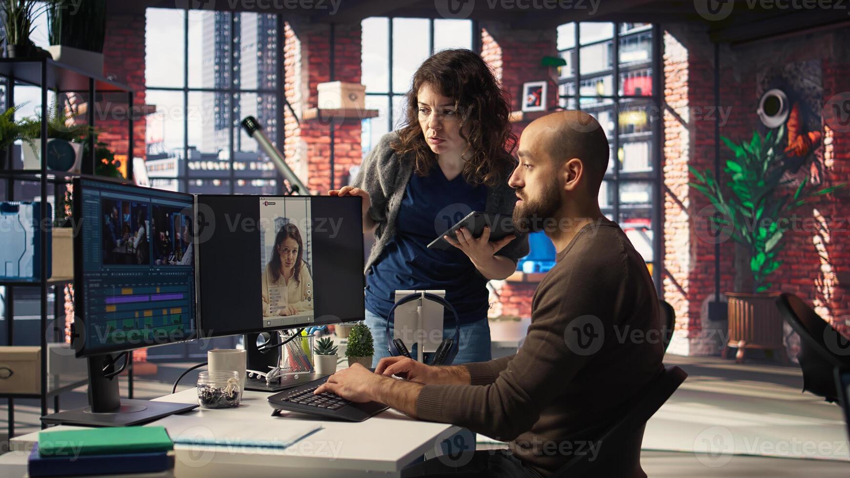 Professional editor uses AI powered software and PC reels in a creative office, marketing strategy used in targeting viral trends and boosting online followers and exposure. Camera A. photo