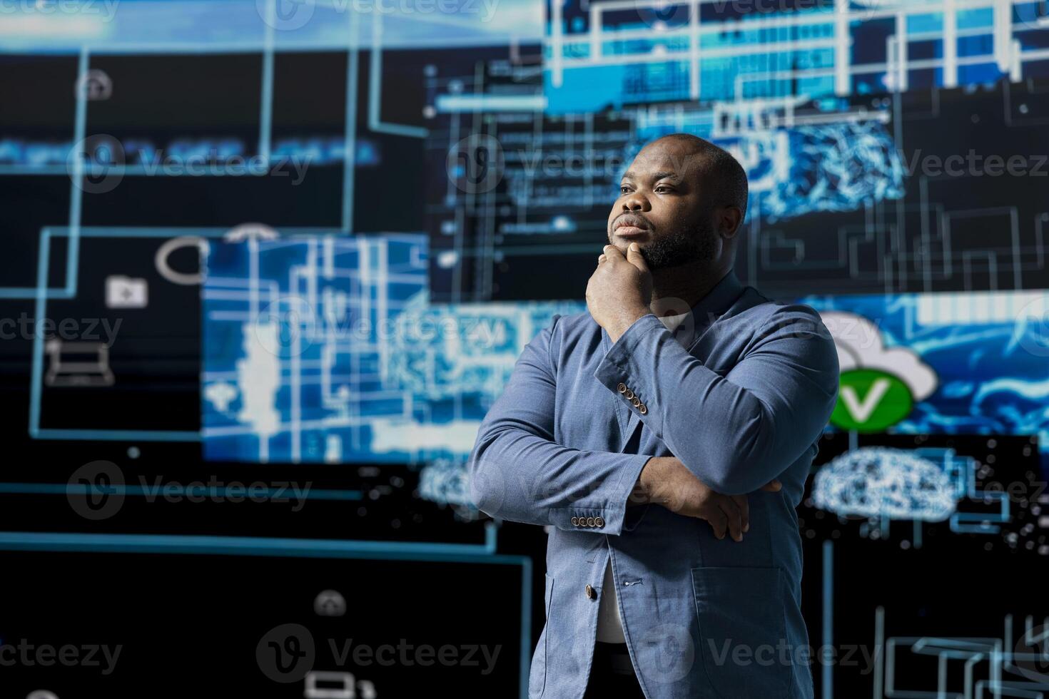 African American businessman studying digital AI brain interface, symbolizing neural networks, data science and algorithmic thinking. Cybernetics for a high tech futuristic innovation. photo