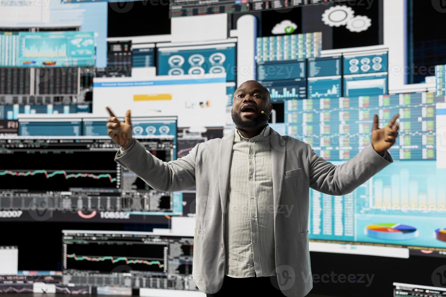 African american public speaker business coach hosting dynamic presentation with a live audience, building new fruitful strategy at a convention. Growth ideas and forecasting in business event. photo