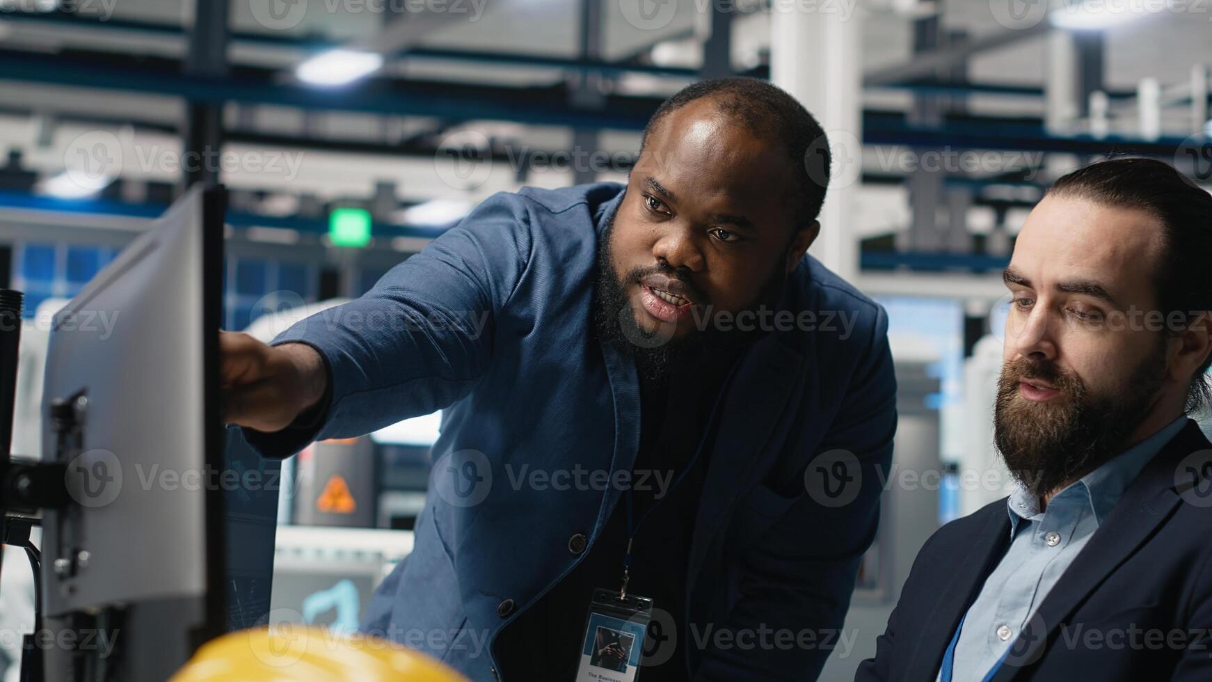 Multiethnic team of engineering consultants working together for solar energy manufacturing process, strengthening infrastructure and business development. Renewable energy in a plant. Camera B. photo