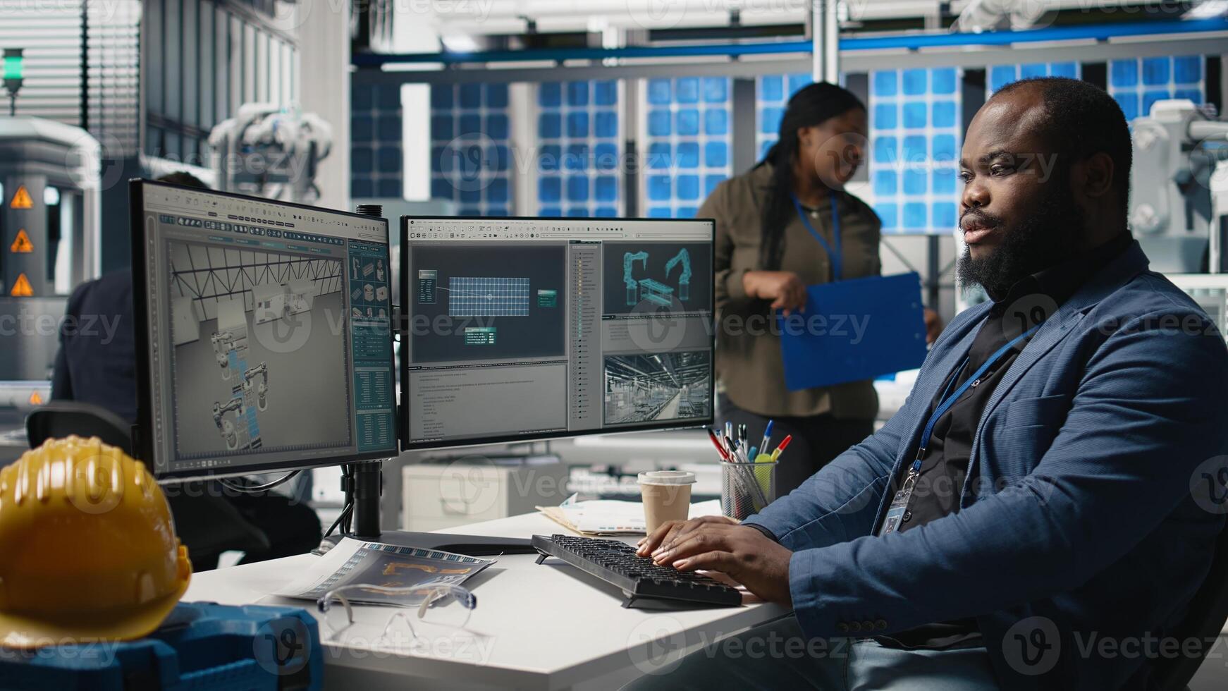 Industrial specialist handling the assembling process on computer, working on clean sustainable energy by creating solar panel factory. Engineering innovation for production flow. Camera A. photo