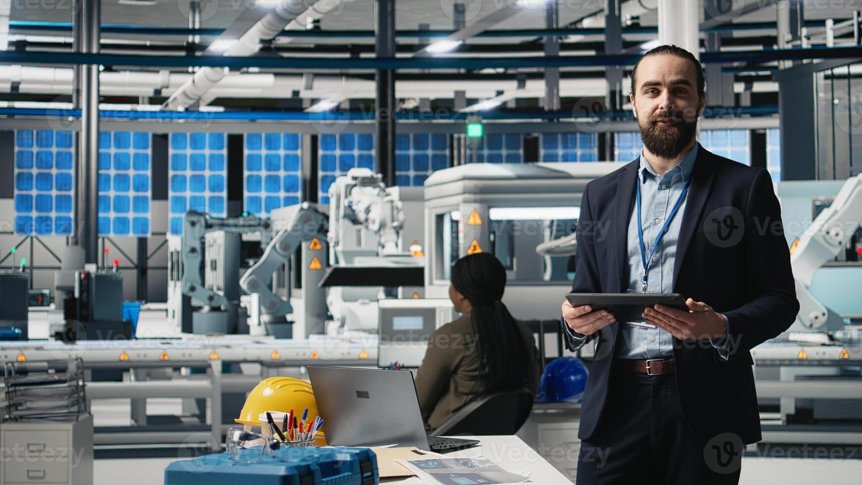 Male entrepreneur hosting advertising presentation for business marketing, promoting a solar panels manufacturing plant. Industry expert consultant focusing on green technology. Camera A. photo