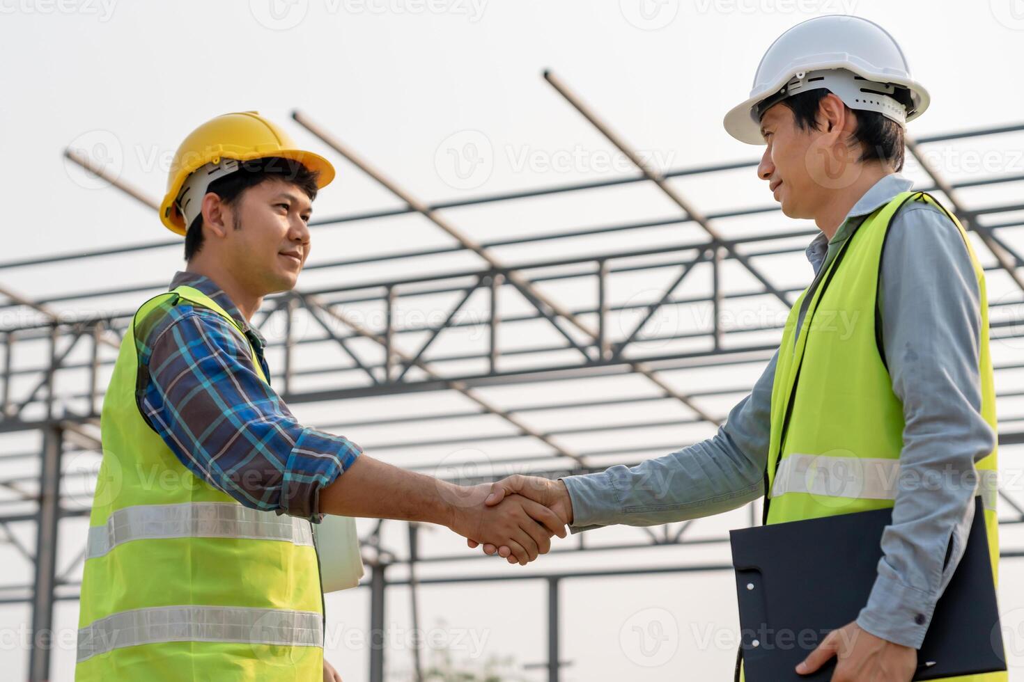 team shaking greeting start up plan new project contract in office center at construction site, industry ,architecture, partner, teamwork, agreement, property, contacts. photo