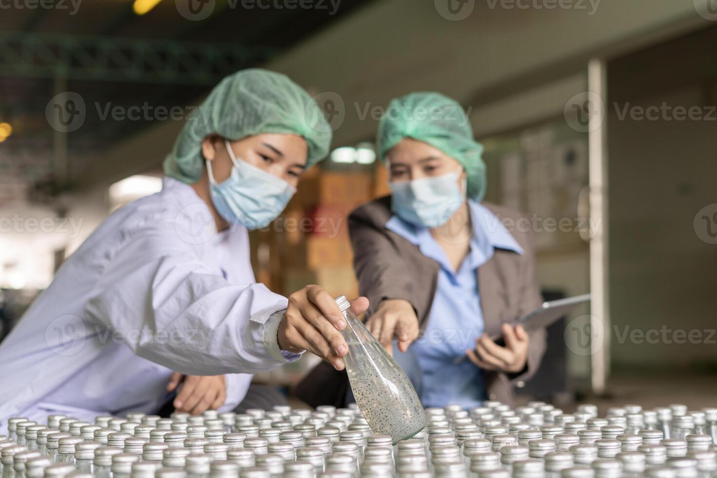 Inspector of food or beverage inspection about quality control food or beverages on warehouse before send product to the customer. Quality control or assurance, Good standard photo
