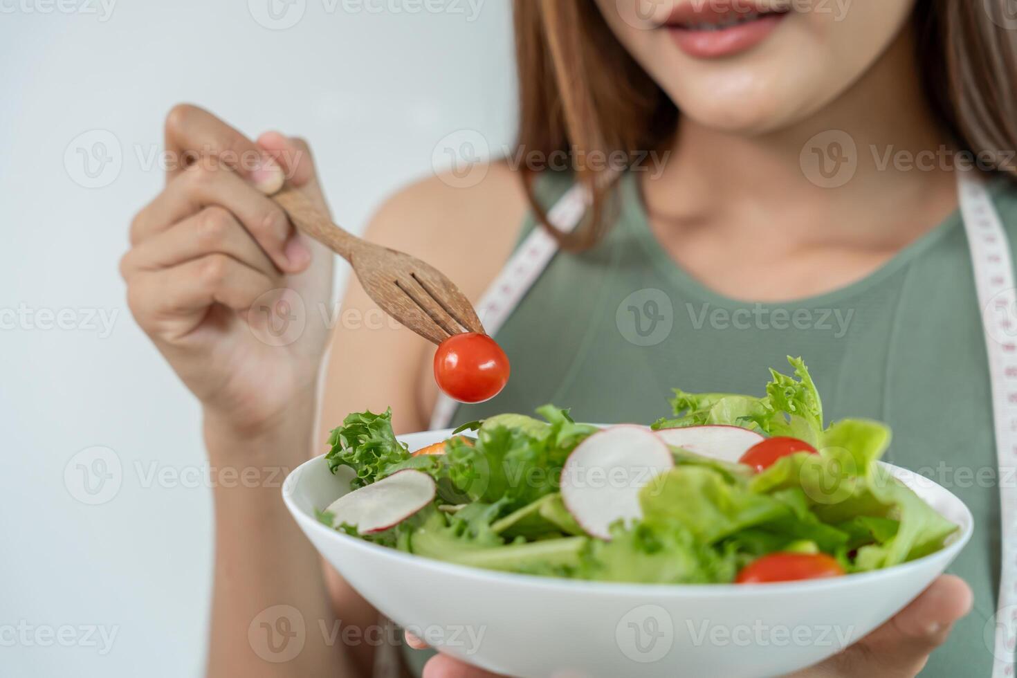 asian women choose healthy foods, dieting female choose salad for diet. Good healthy food. weight lose, balance, control, reduce fat, low calories, routines, exercise, body shape. photo