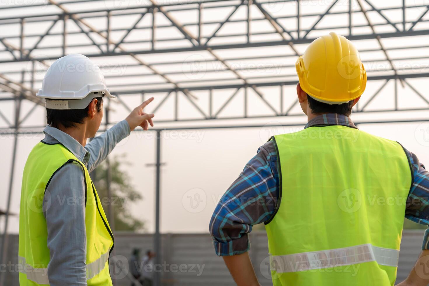 inspector engineer and owner project is inspecting construction and quality assurance new house. Engineers or architects or contactor. work to build the house before handing it over to the homeowner photo