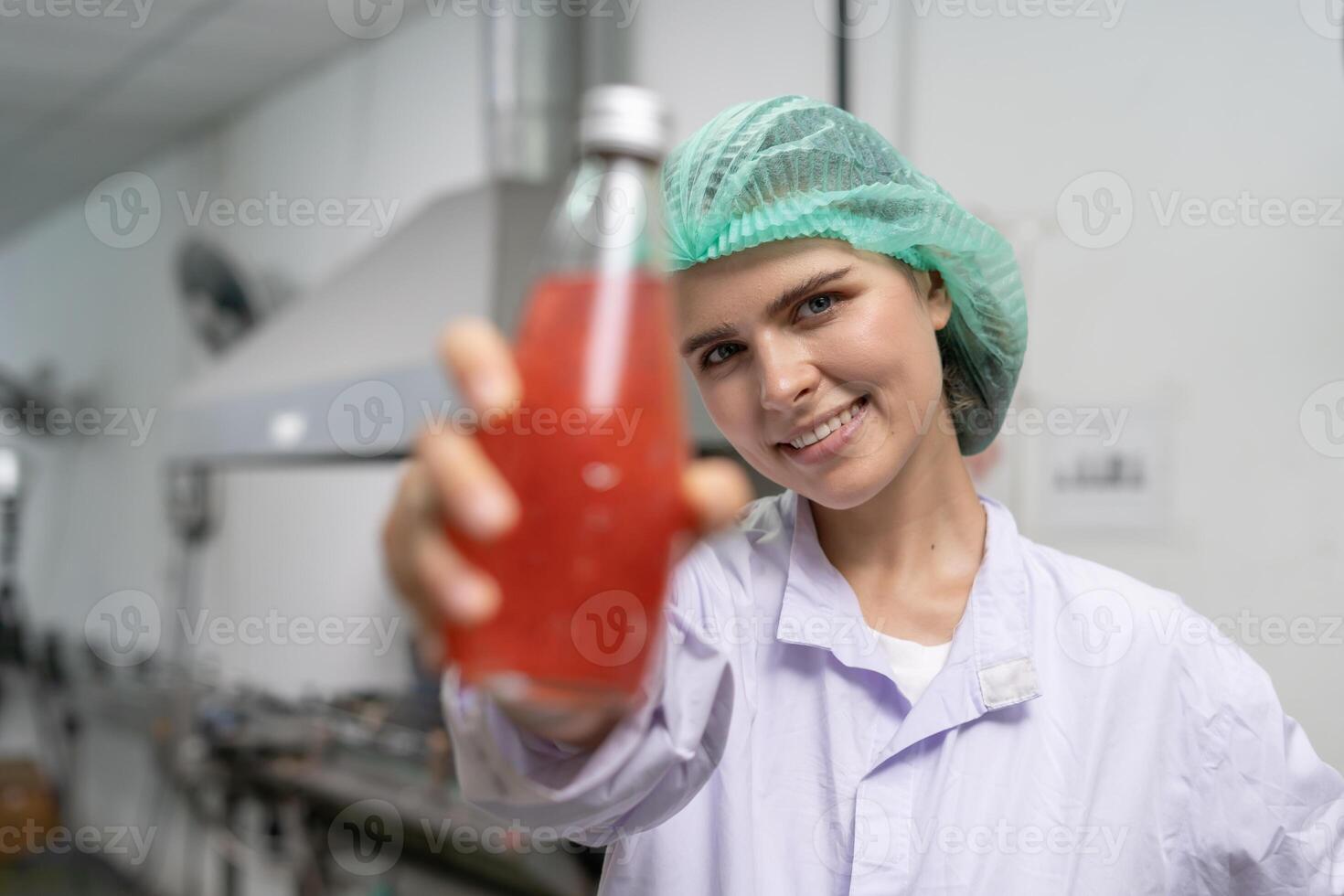 inspector food or beverages technician inspection about quality control food or beverages before send product to the customer. Production leader recheck ingredient and productivity. photo