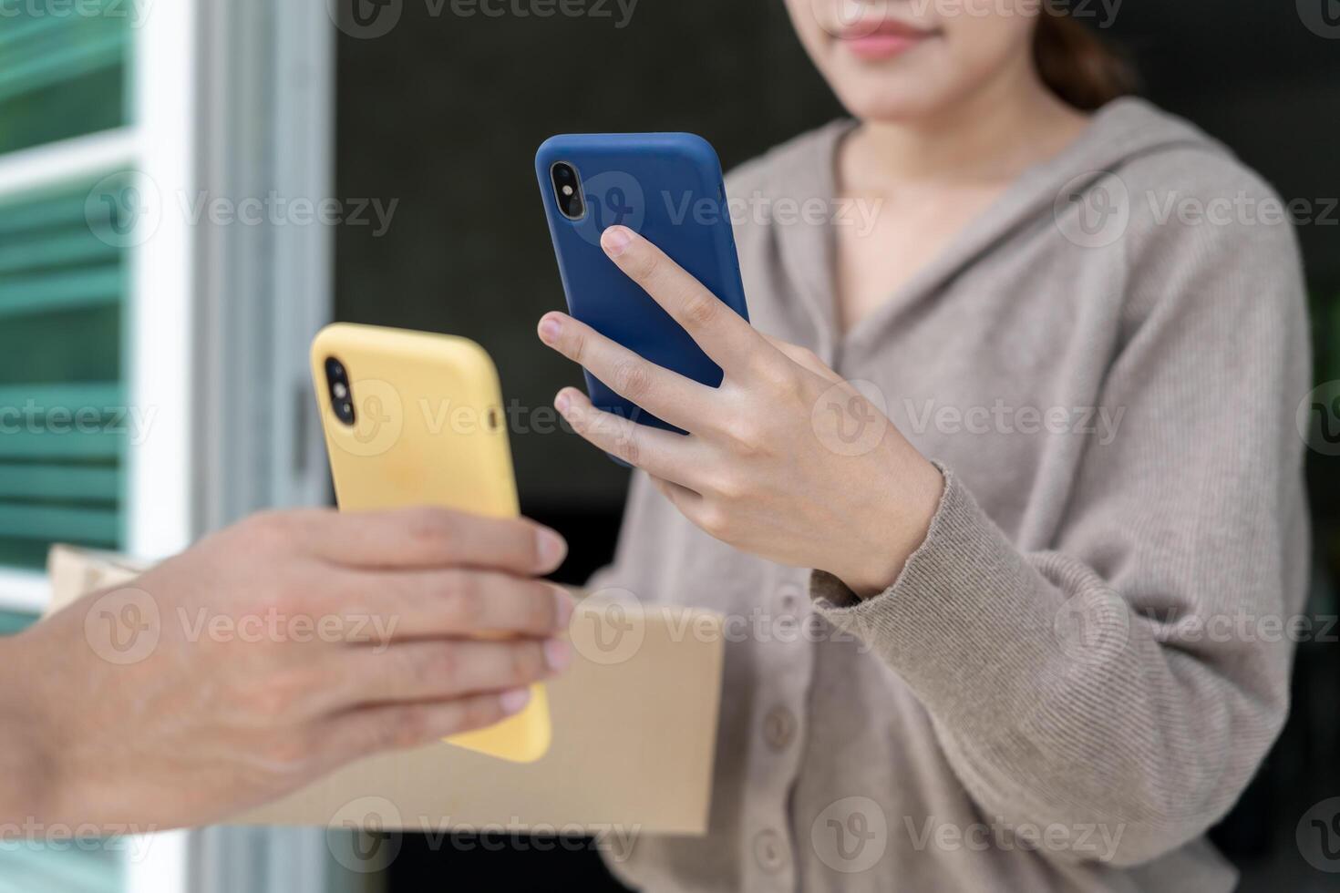 Happy smile Asian woman scan QR code for pay of food. Delivery man send deliver express. online shop, paper container, takeaway, postman, delivery service, packages, Digital transfer. photo
