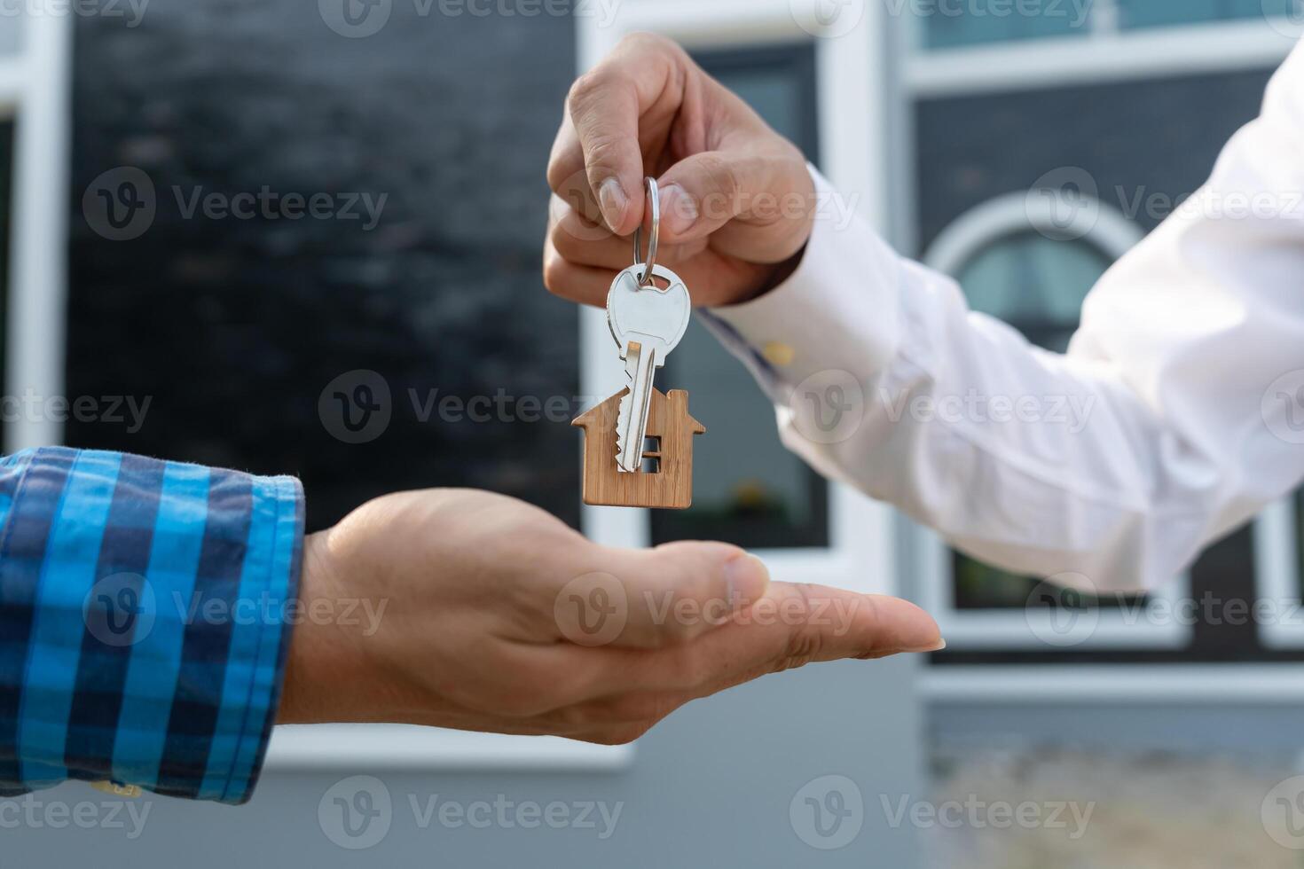lease, rental and selling home. Real estate agent manager smile holding key for new owner. rent house, Sales, loan credit financial, insurance, Seller, dealer, installment, buy, sell, move in. photo