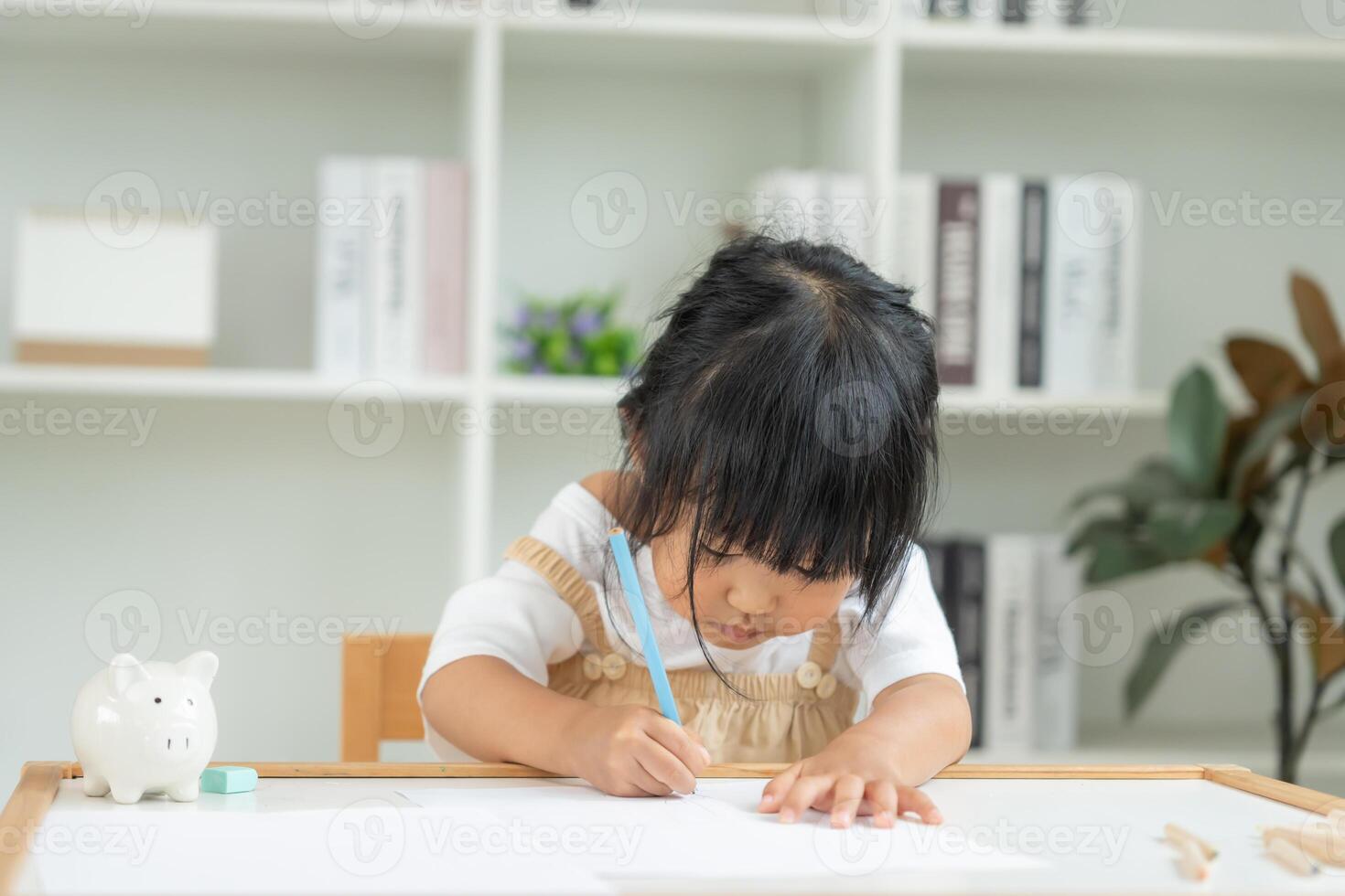Happy Asia children learning and enjoy paint. family is happy and excited in the house. Mother and daughter having fun spending time together. Holiday, Activity, photo