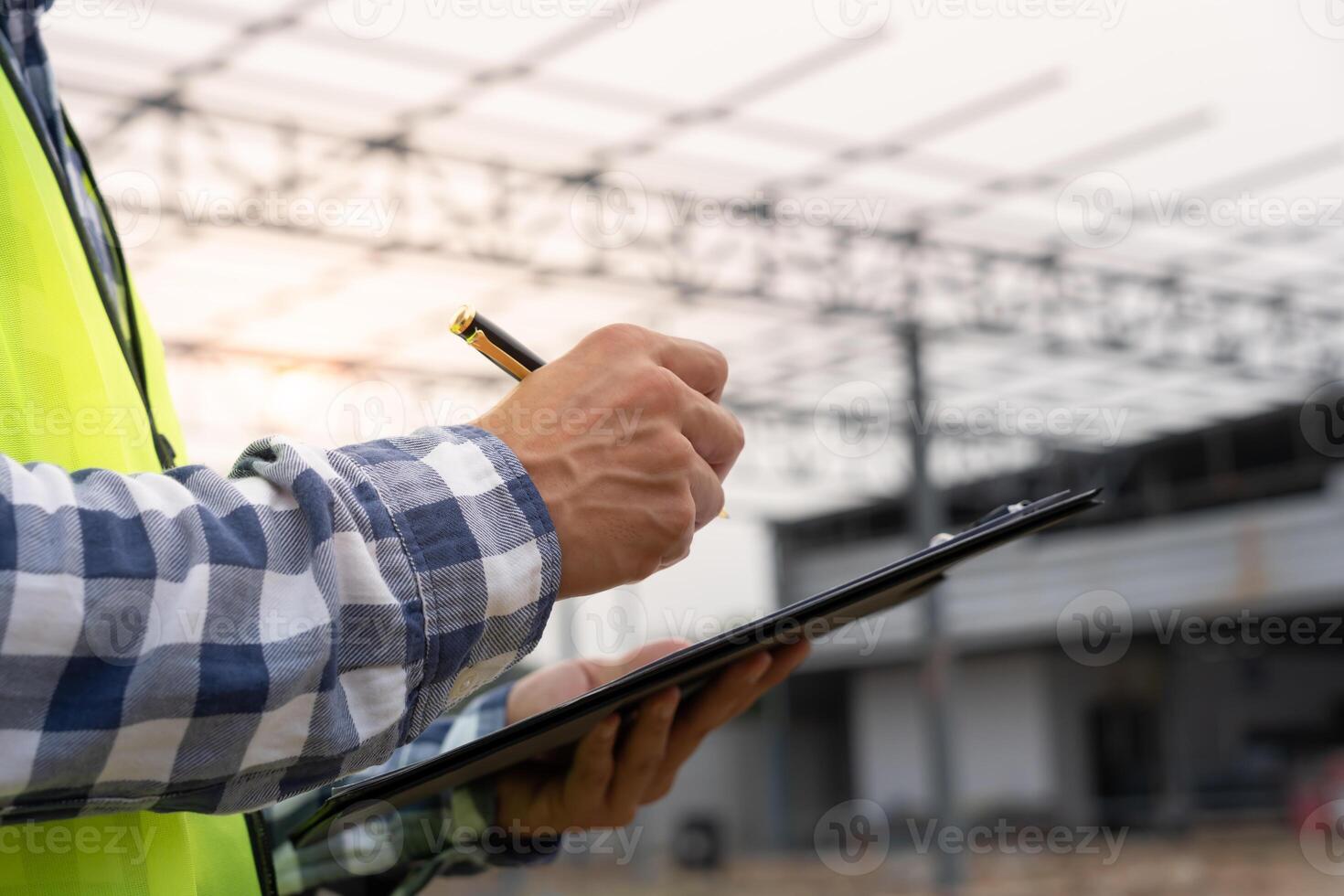 inspector or engineer inspecting construction and quality assurance new house. Engineers or architects or contactor work to build the house before handing it over to the homeowner photo