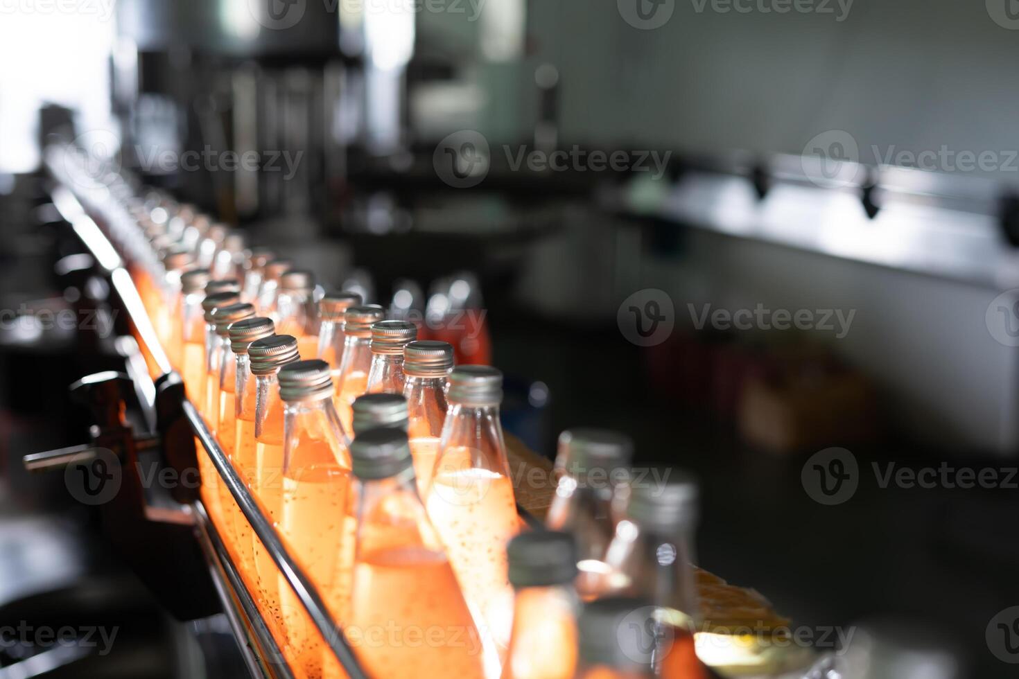 Factory of food, Conveyor for feed bottle, food or beverages on warehouse before send product to the customer. Quality control or assurance, Good standard photo