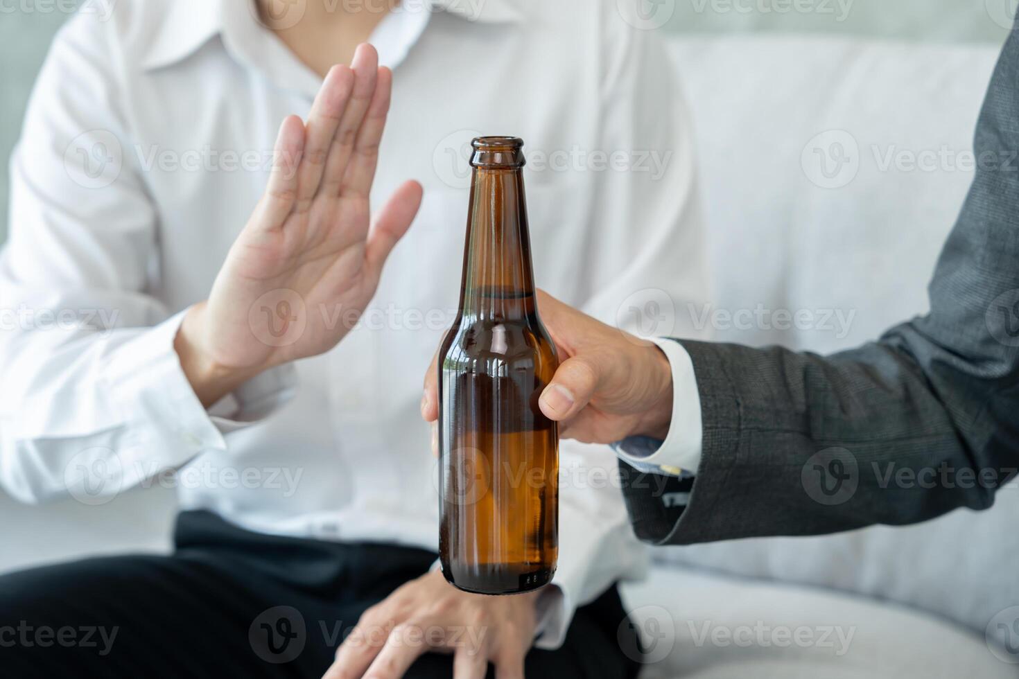 refuses say no and avoid to drink an alcohol, hand show reject and stopping, alcoholism treatment, alcohol addiction, quit booze, Stop Drinking Alcohol. Refuse bottle liquor. photo