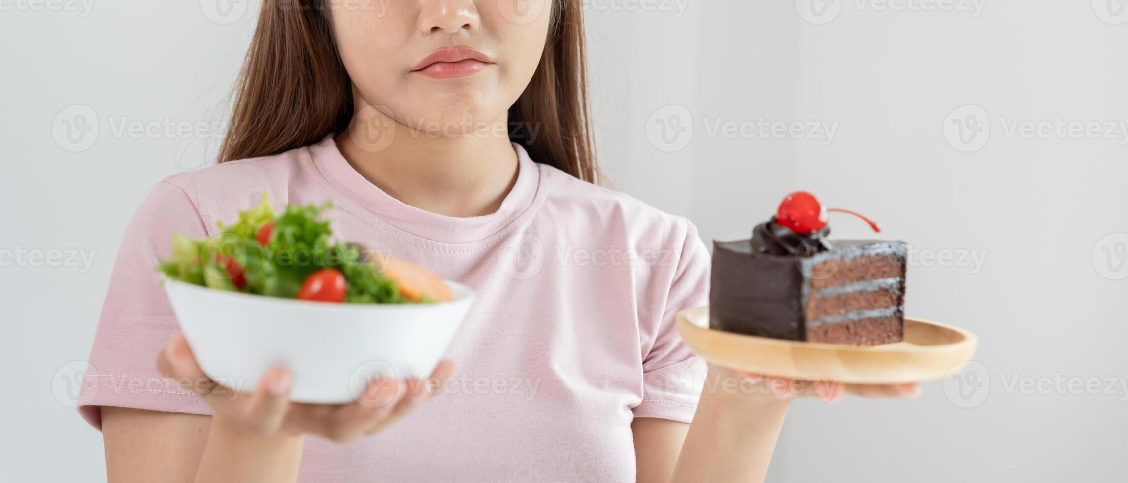 slim asian women very bored diet food, dieting female choose low calories food for diet. Good healthy food. weight lose, balance, control, reduce fat, routines, exercise, body shape photo