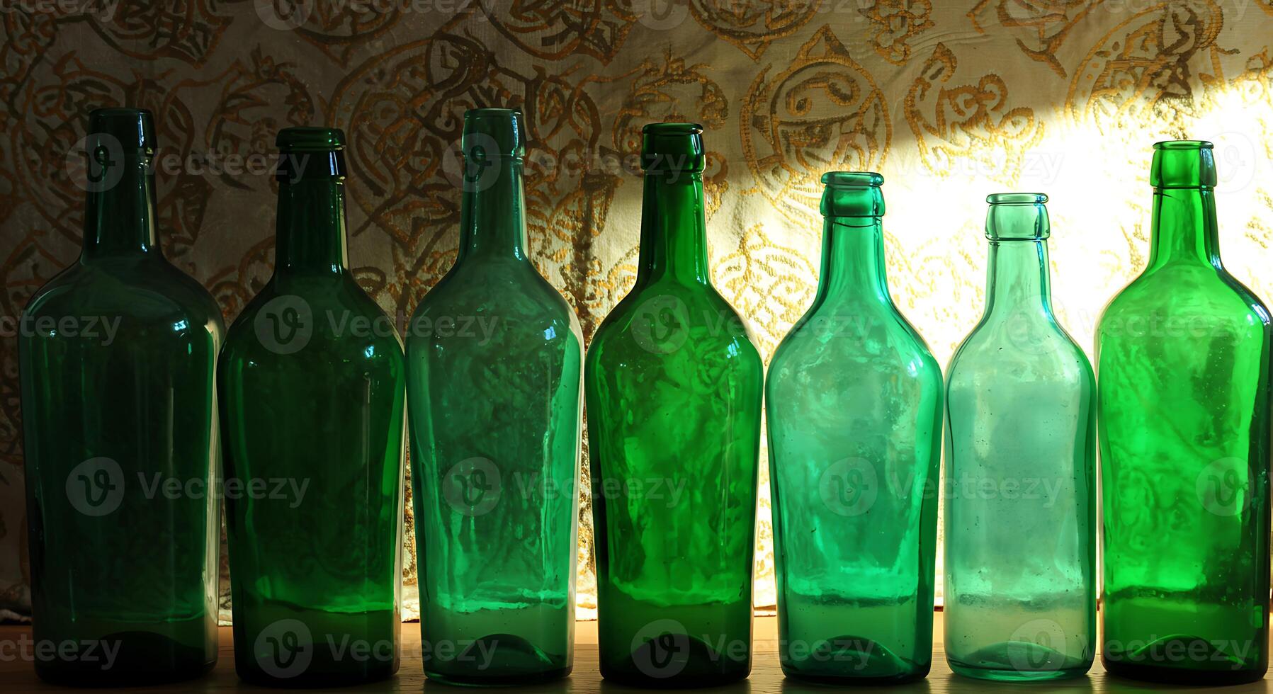 Green Bottles in a Row a Display of Various Glassware on Wooden Surface photo