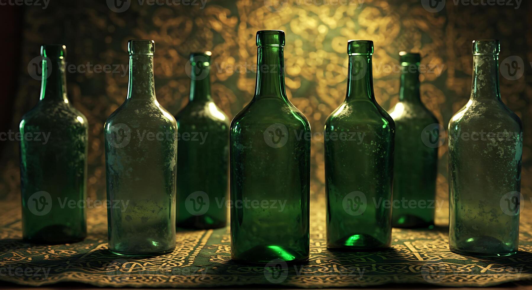 Green Glass Bottles on Table with Patterned Background and Dramatic Lighting photo