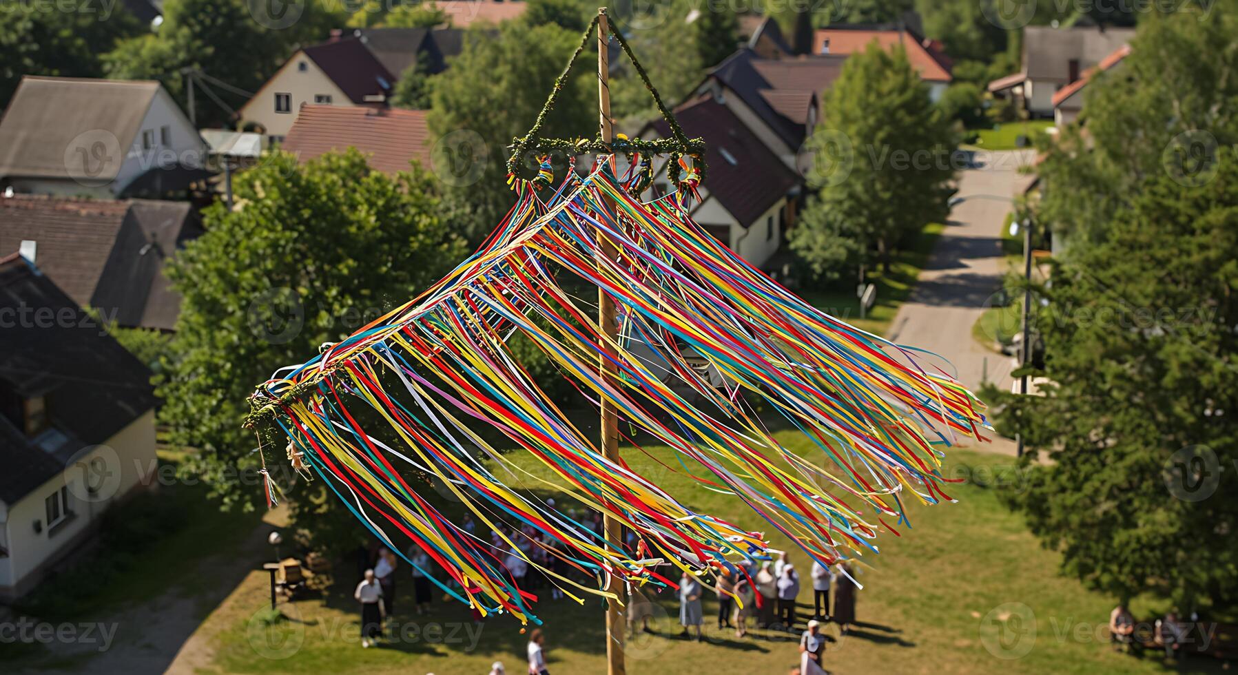 Maypole Tradition Celebration with Ribbons in Village Green Landscape photo