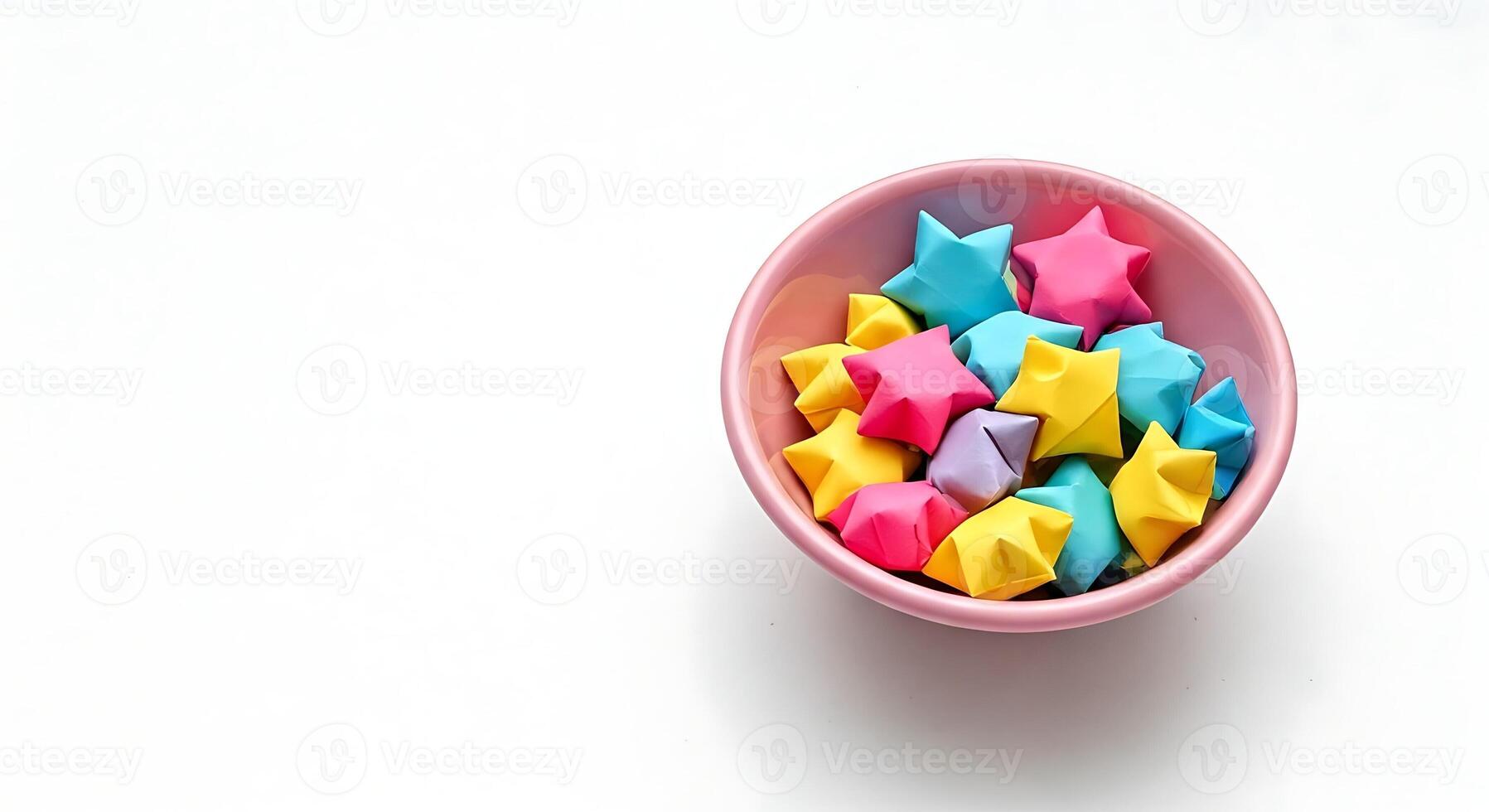 A bowl filled with colorful paper stars photo
