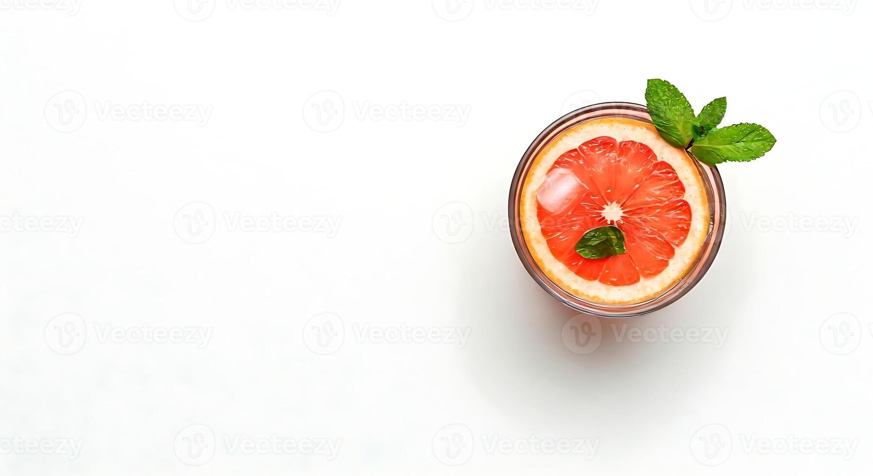 Grapefruit Citrus Drink with Mint Garnish on White Background photo