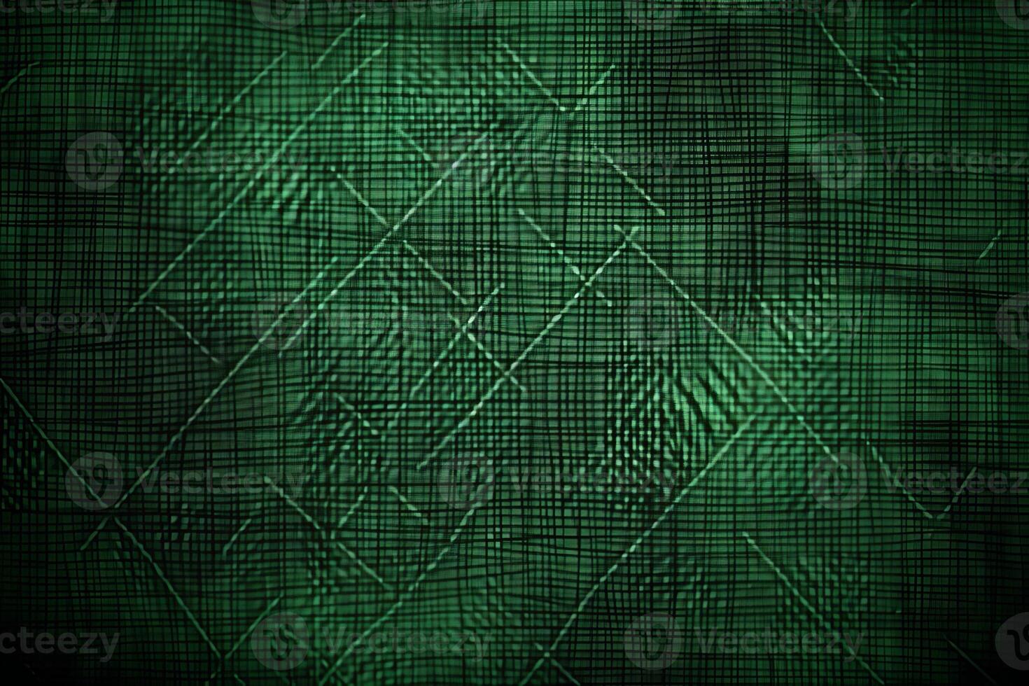 Intricate patterns weave through a dark green surface, imbuing the space with a rich, ancient feel that invites exploration and contemplation photo