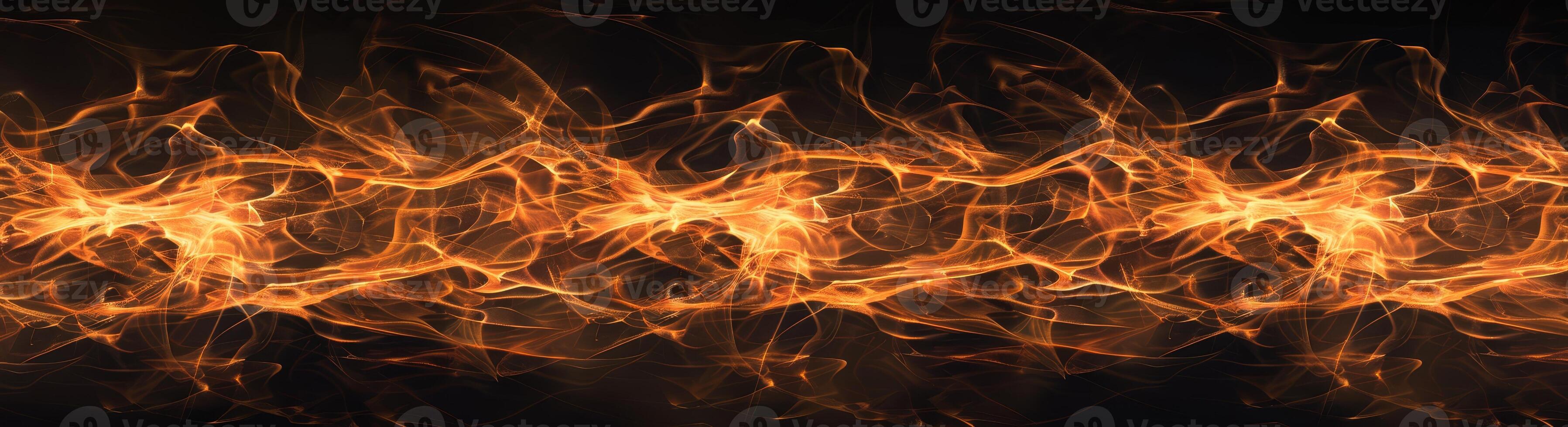 Flames dance and twist in vibrant hues of orange and yellow, creating a mesmerizing pattern on a dark canvas that evokes warmth and intensity photo
