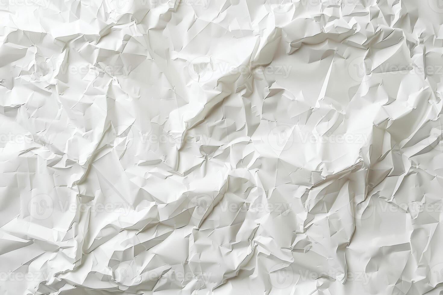 Crumpled white paper showcases intricate textures and patterns, inviting creative expression through design or artistic endeavors photo