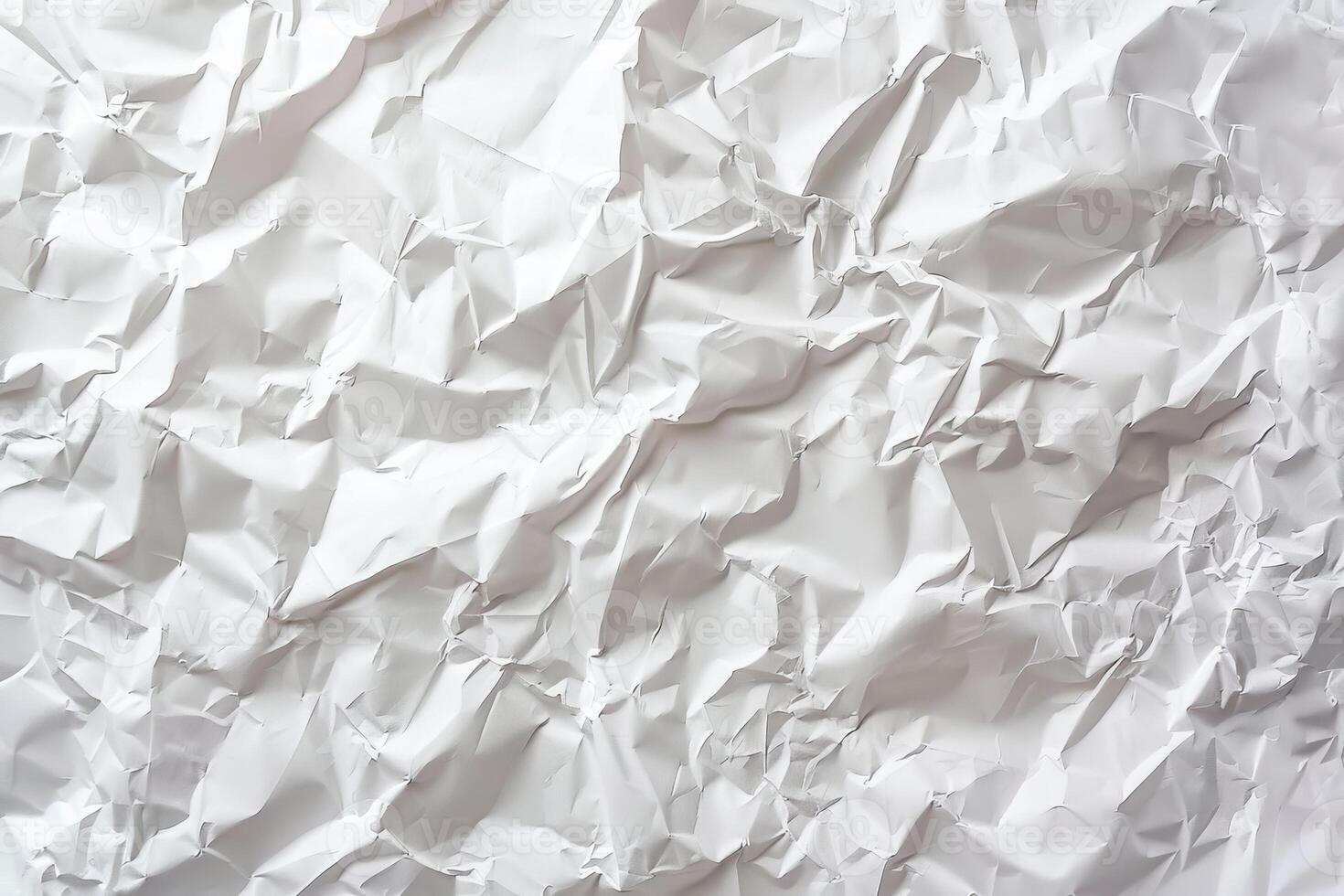 White crumpled paper texture offers an inspiring backdrop for artistic expression, enhancing design projects with its unique depth and character photo