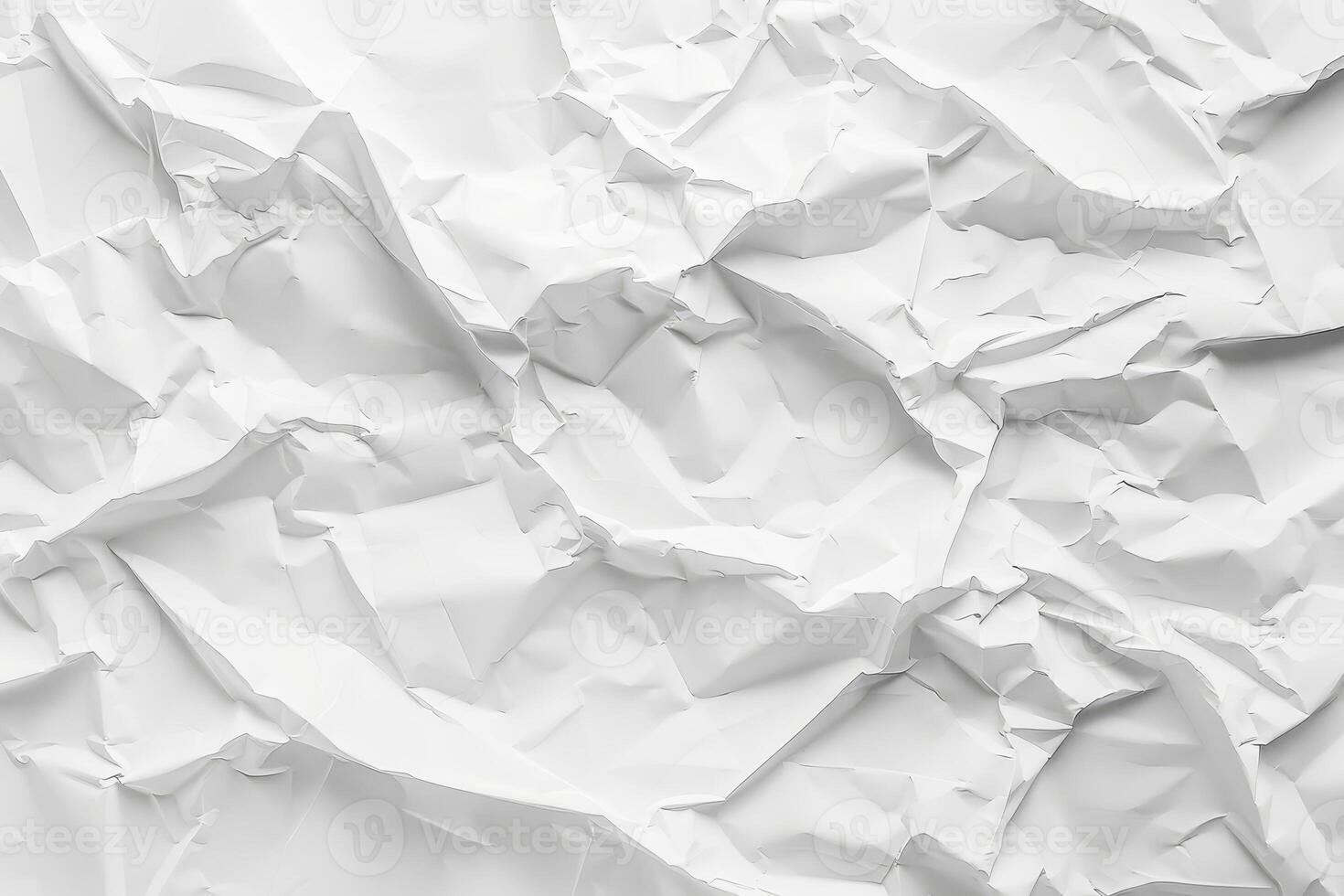 A textured background showcases a beautifully crumpled white paper, inviting creativity and imagination for artistic expressions and design projects photo