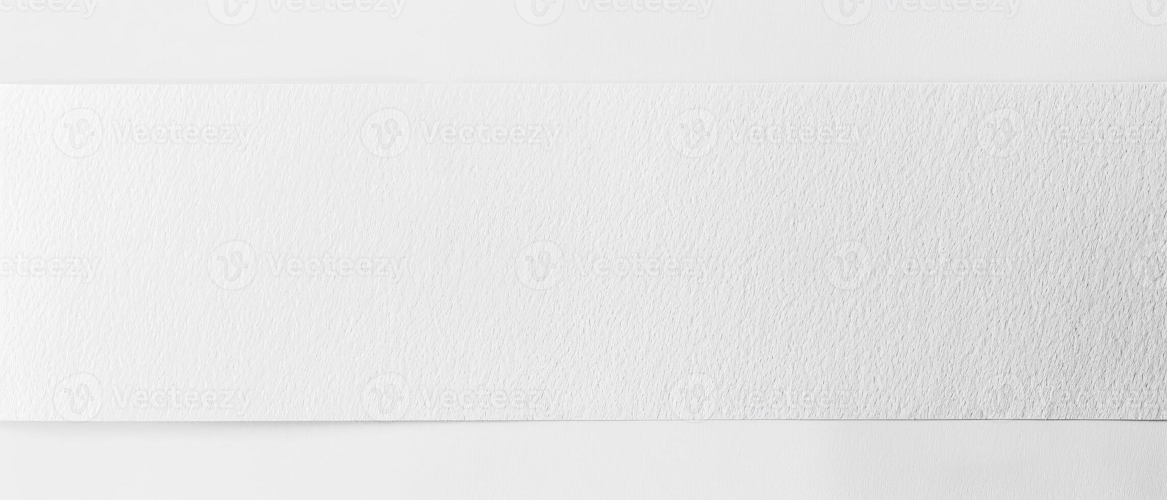 Soft white paper texture fills the space, offering a minimalistic canvas for artistic expression and imaginative endeavors photo