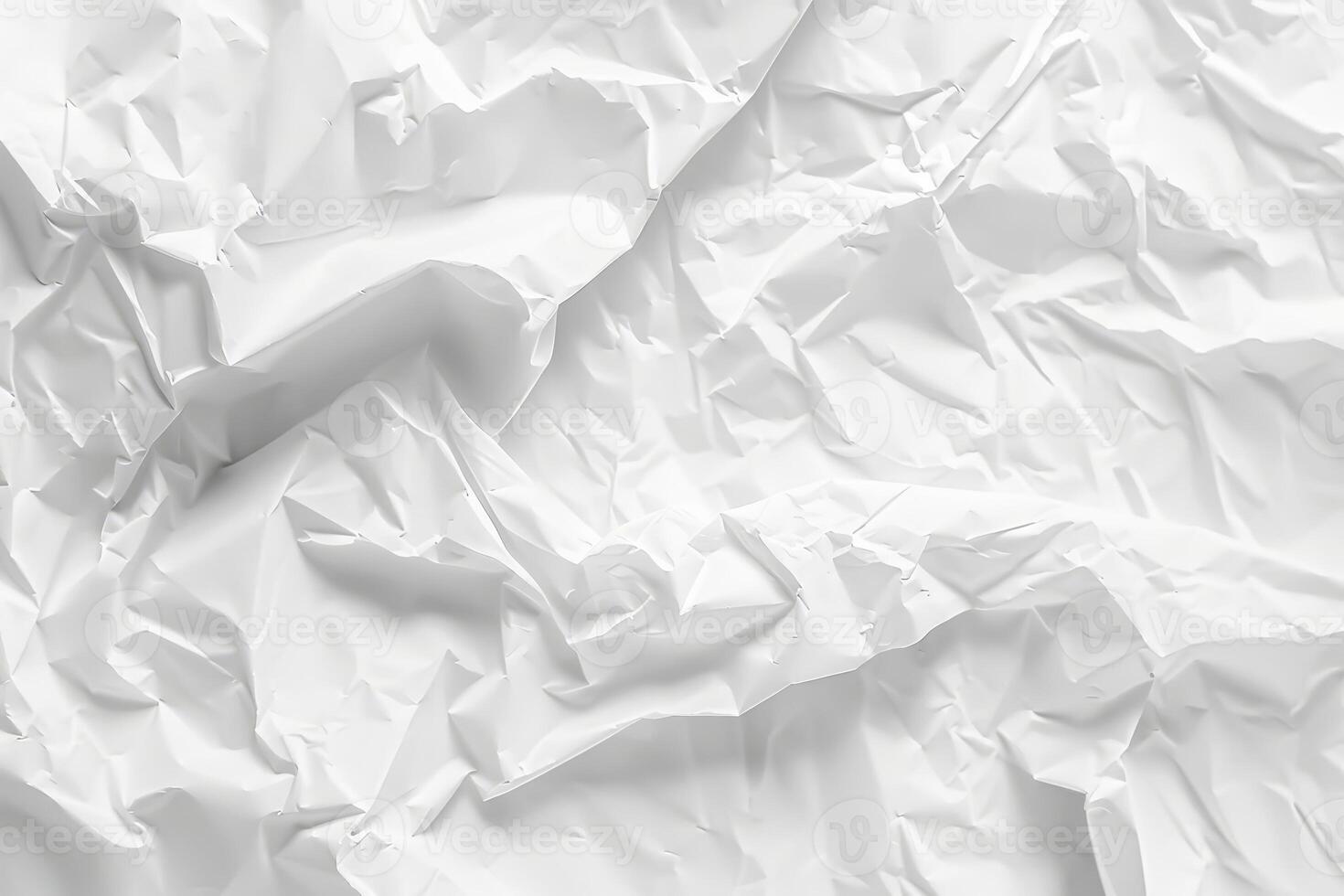 A textured white surface features crumpled patterns, inviting creativity and inspiration for various artistic projects and designs photo